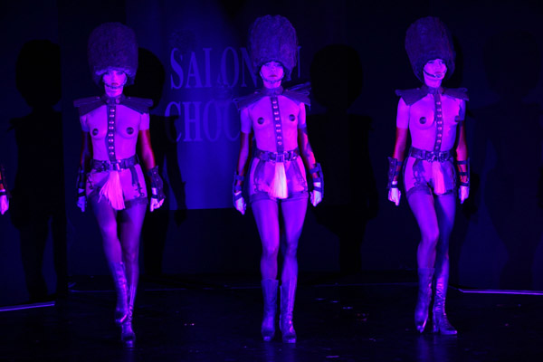 Crazy Horse dancers display a chocolate decorated dress created by chocolate maker Patrice Chapon Porte Versailles