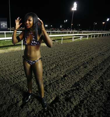 In the annual foot-race 16 girls run on a track between horse races