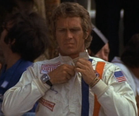 Стив МакКуин (Steve McQueen) с часами TAG Heuer MONACO  в фильме Le Mans